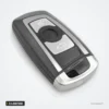 Clé télécommande 3/4 boutons pour BMW Série 3, Série 5, X5, X6 - vue de trois quarts, boutons visibles