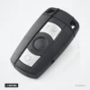 Coque de clé 3 boutons pour BMW Série 1, Série 3, Série 5, X5 - vue de trois quarts, bouton rond central