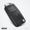 Coque de clé pliante 2/3 boutons pour Volkswagen Golf, Passat, Polo, Seat Leon - coque vue de face sous un angle incliné