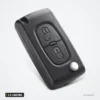 Coque de clé pliante 2 à 4 boutons pour Citroën C3, C4, C5, Peugeot 407 - vue de trois quarts, lame repliée