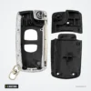 Coque de clé pliante 2 boutons pour Mazda 2, 3, 6, 323 - coque ouverte, compartiment pile et mécanisme visibles
