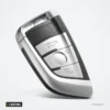 Coque de clé télécommande 3 boutons pour BMW Série 1, 2, 7, X5, X6 - vue inclinée, boutons et bord chromé